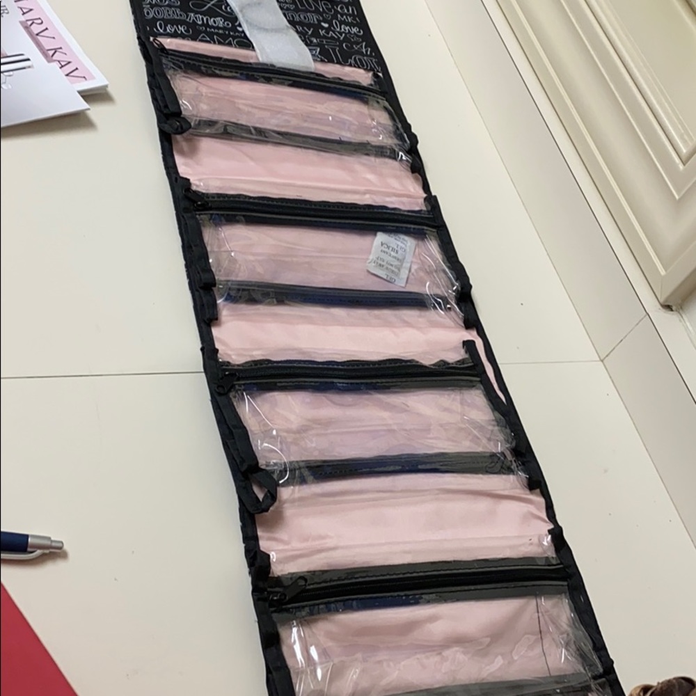 Traveling roll up cosmetic bag hangable! Mary Kay